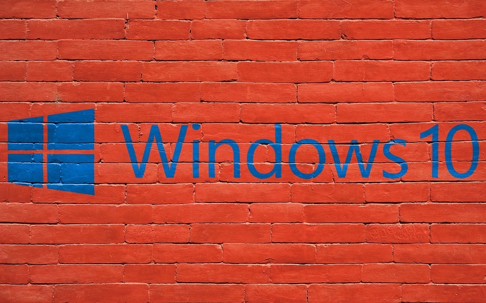 a logo of windows 10 with red wall background