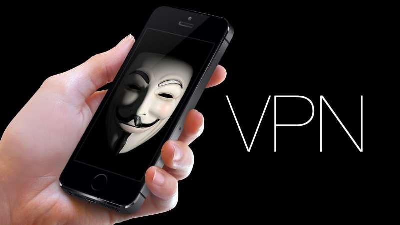 vendetta's mask on an iPhone with VPN word on the side