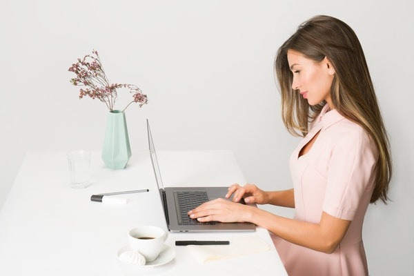 woman browsing on laptop