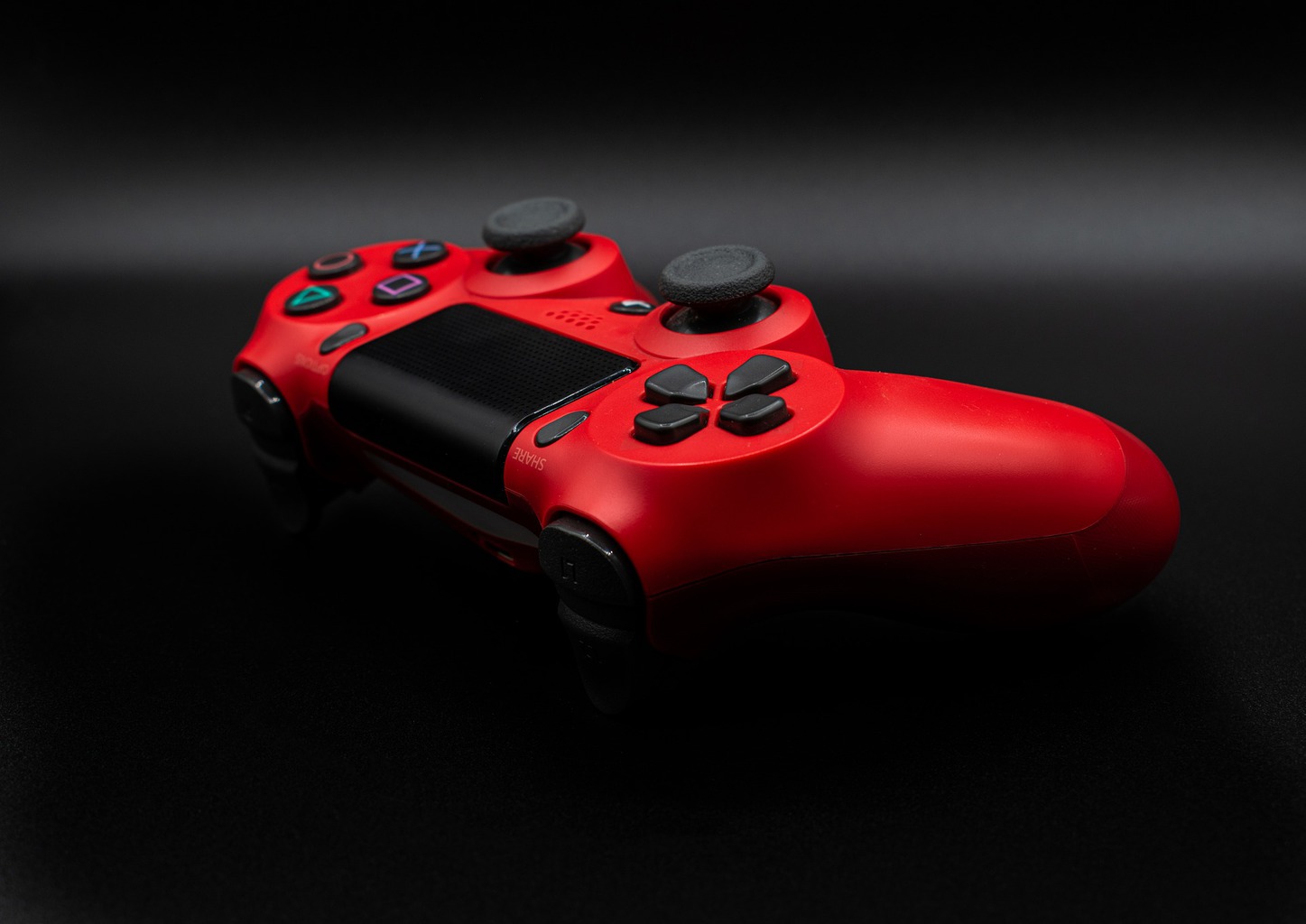 A red PS4 controller silicone skin